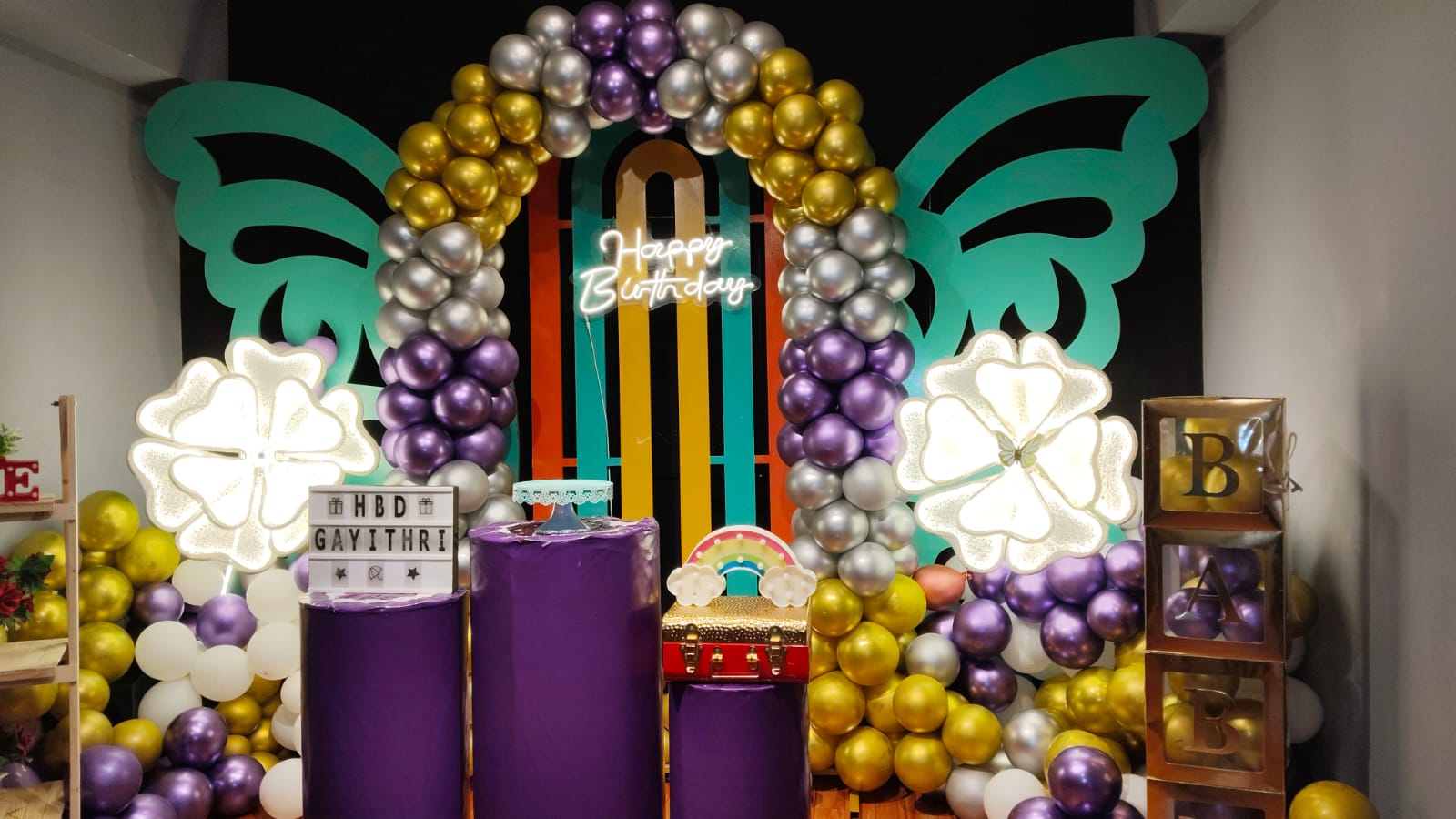 Personalised purple and gold birthday setup